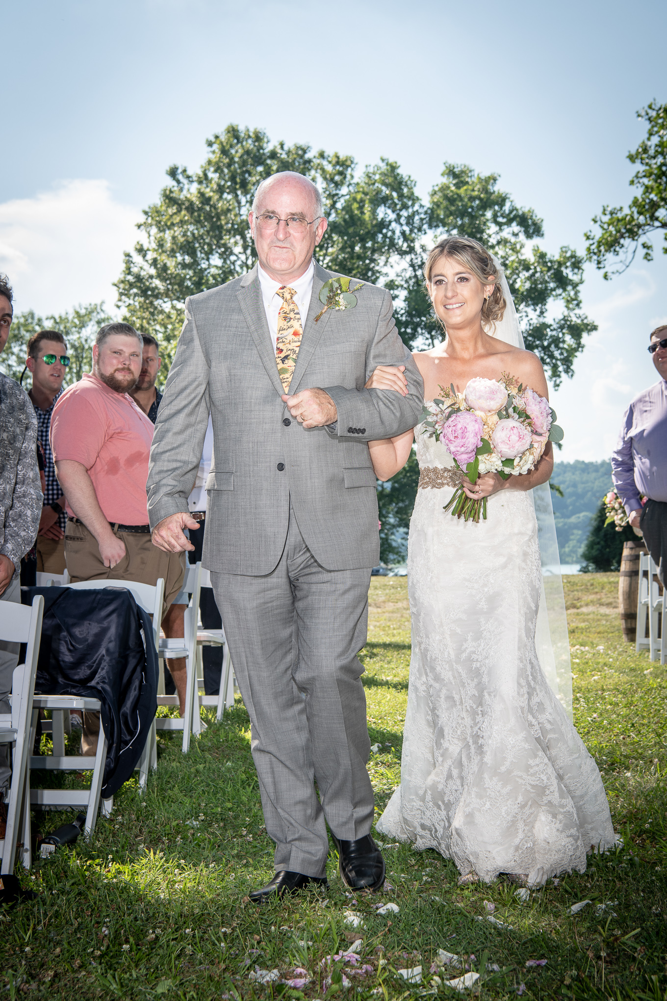 bride and her father walking down the aisle 